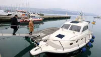 (FOTO) Ministra podpisala dogovor o prenosu plovila Rab 830 patrol