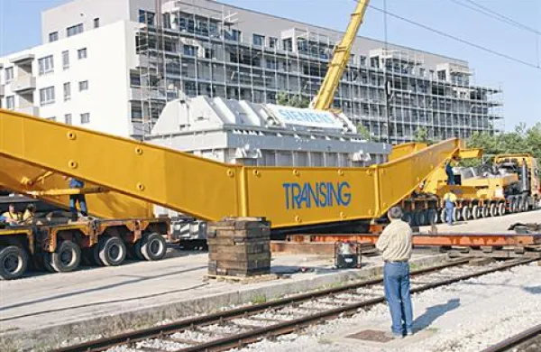 546 ton na 300 kolesih skozi Divačo