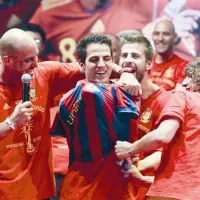 Katalonski  reprezentant  si je na slavju v čast svetovne nogometne krone v Madridu čez nacionalni rdeči dres nadel Barceloninega