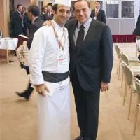 Silvio Berlusconi in Tomaž Kavčič po kosilu v Bruslju. Italijanski premier si zdaj želi priti še na  Zemono.