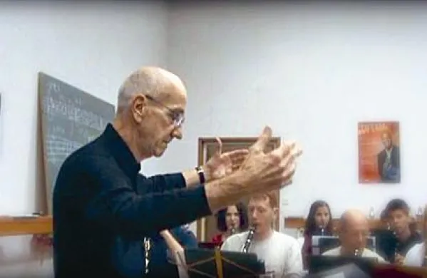 Ameriški dirigent John Stanley z orkestrom  rudarjev v Idriji 