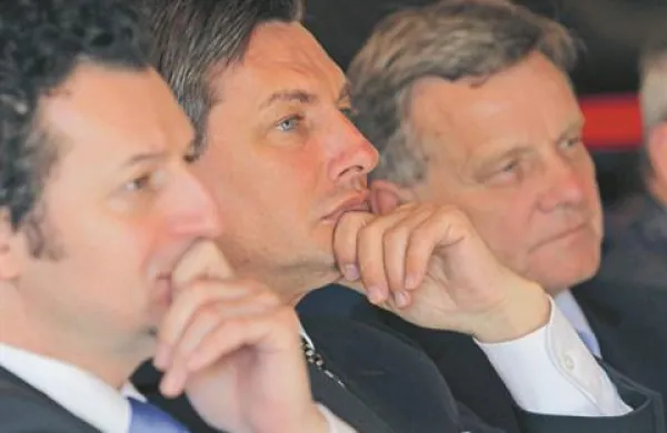 Minister za promet Patrick Vlačič, premier Borut Pahor in nekdanji prvi mož nemške železniške družbe DB Hartmut Mehdorn
