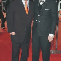 Elton John s partnerjem Davidom Furnishem, ki bo tudi sodeloval pri realizaciji filma.