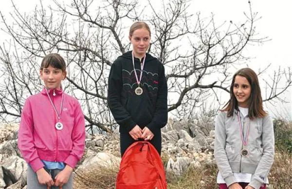 Teja Jenko na vrhu stopničk