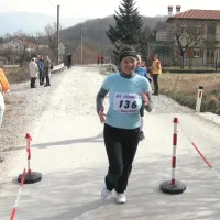 Slađana Pavšič prihaja v cilj. Proga ji je bila zelo všeč, vključno z blatom.