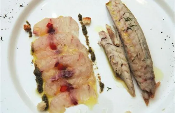 Ruskemu premierju Vladimirju Putinu so na včerajšnji svečani večerji postregli tudi s piranskim brancinom. Fotografija je simbolična.