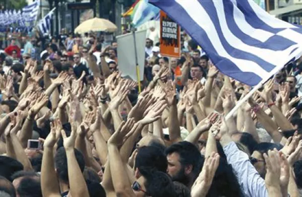 Demonstracije blizu parlamenta v Atenah. 