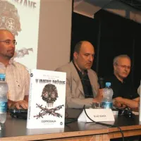Prvo knjigo V imenu države so včeraj predstavili v Kinu Šiška v Ljubljani (od leve proti desni): Blaž Zgaga, Janez Markeš, Matej Šurc in urednik založbe Sanje Rok Zavrtanik 