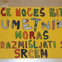 Plakat na oglasni deski umetniške gimnazije v Kopru