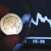 Borzni indeksi, evro in nafta dol, zlato pa gor