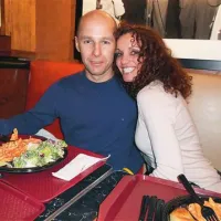 Metka Albreht z Borutom Kreftom na zadnji večerji pred maratonom