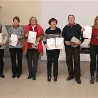 Najboljši sodelujoči fotografi ter Bojana Vidmar (levo) in Stojan Gorup (desno)