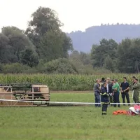 &Scaron;tirje mrtvi v strmoglavljenju balona v Ljubljani