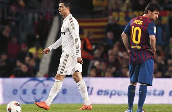 V nedeljo neodločeno 2:2 - Cristiano Ronaldo (na fotografiji levo) : Lionel Messi  