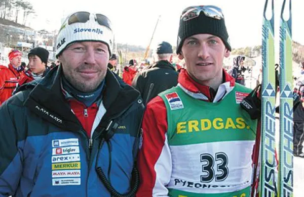 Jakov Fak in trener Uroš Velepec