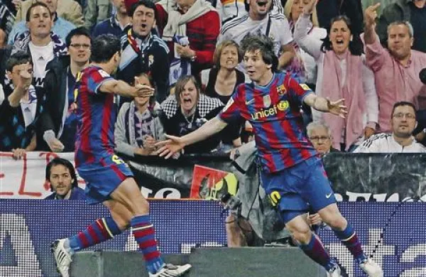 Bosta Xavi (levo) in Messi drevi razjezila tudi Milanove privržence?