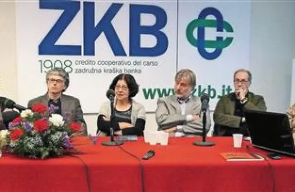  Sodobni tržaški romanopisci na 23. Primorskih slovenističnih dnevih (z leve): Sergej Verč, Igor Škamperle, Jasna Jurečič, Dušan Jelinčič, Marko Sosič, Vilma Purič in moderatorka Loredana Umek