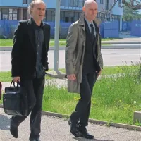 Rektor Dragan Marušič z odvetnikom Velimirjem Cugmasom