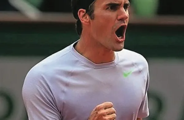 Drugi nosilec Švicar Roger Federer se je v osmini finala precej namučil, a kljub težavam napredoval med osem najboljših