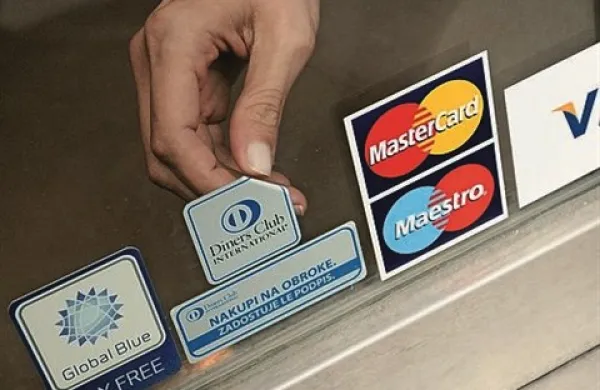 Dolgove bo plačal Diners international