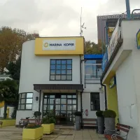 Marina Koper, ki je v lasti podjetja Grafist, od Zveze društev zahteva 656.762 evrov odškodnine