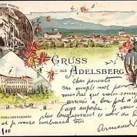 Razglednica Postojne iz leta 1900, na kateri je tudi luksuzni postojnski hotel. 
