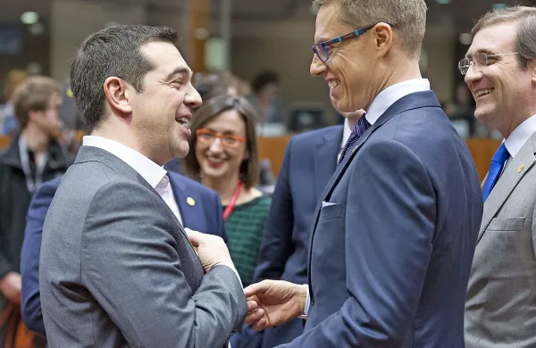 Grški premier Aleksis Cipras (levo) v Bruslju.