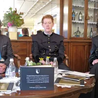 Domen Prezelj, Andrej Lazar in Tina  Benčina na predstavitvi 
zbornika 350 let Godbenega društva rudarjev.