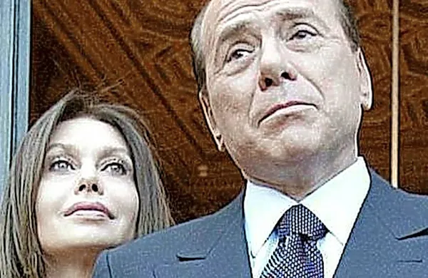 Silvio Berlusconi z bivšo ženo, ki ji mora vsak mesec izplačati 
1,4 milijona evrov preživnine.