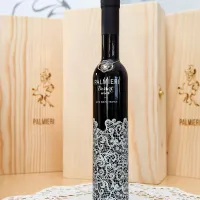 Za slovensko steklenico vina z idrijsko čipko od&scaron;tel več kot pol milijona evrov