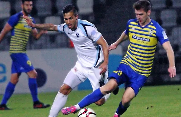 Marko Krivičič (desno) odhaja v FC Bologna.
