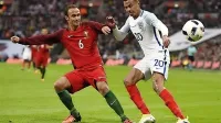 Ricardo Carvalho (levo) bo drevi s Portugalci lovil svoj drugi  
finale po dvanajstih letih.  