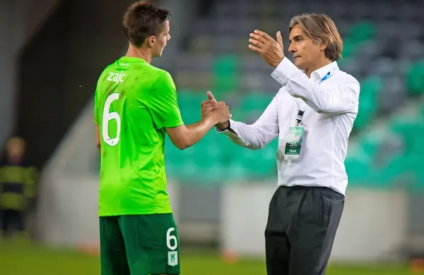 Rešitelj Olimpije Miha Zajc (levo) in  trener prvakov Rodolfo 
Vanoli.