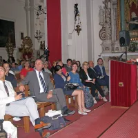 Umetnostni zgodovinarji v cerkvi o  Carpacciu