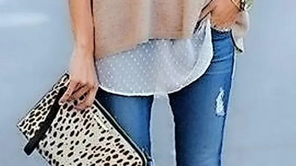 Tudi v ohlapnem puloverju smo lahko videti elegantne.
