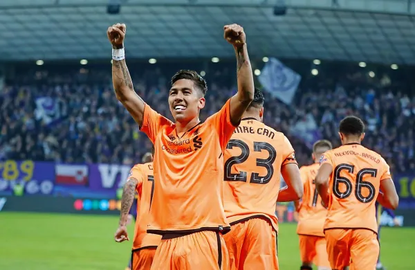 Strelec dveh zadetkov za Liverpool Roberto Firmino, ki je tudi 
prvi načel domačo mrežo.