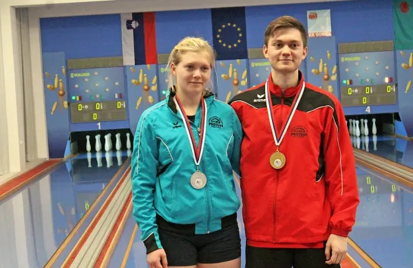 Člana postojnskega Proteusa, srebrna Maša Miklavec in državni 
prvak  Žiga Požar.