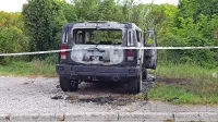Policisti in forenziki so v soboto dopoldne opravili ogled uničenega hummerja.