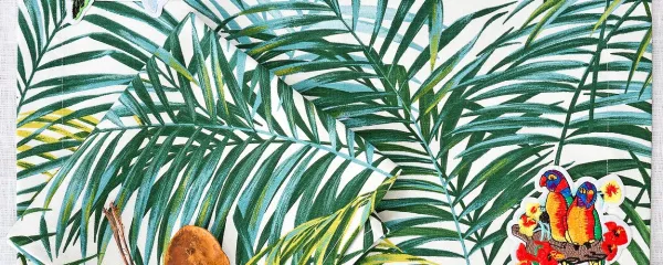 Bombažni pogrinjek in prtički iz kolekcije Palm, oblikovanje Milou 
Milano