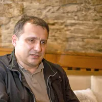 Dr. Erik Brecelj