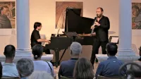  Pri vratolomnih virtuoznih podvigih  je klarinetistu Goranu Bojčevskemu  sledil pianist Jan Sever. 