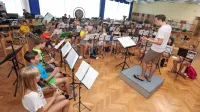 110 mladih godbenikov iz vse Slovenije se izpopolnjuje s pomočjo 14 mentorjev.