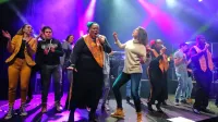 Harlem Gospel Choir je pred letom dni navdušil na koncertu v dvorani koprske osnovne šole  in na 
oder potegnil tudi več obiskovalcev. 
