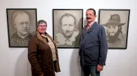 Stanka Golob in mož Milan, za njima na portretih (z leve) Ivan Kokošar, Miha Brovč in Jani Kutin 