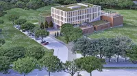 Tako bo videti kompleks  InnoRenew CoE. Višja stavba bo glavna, 
desno ob njej bo enonadstropni laboratorij za kompozite iz lesa in 
drugih materialov.