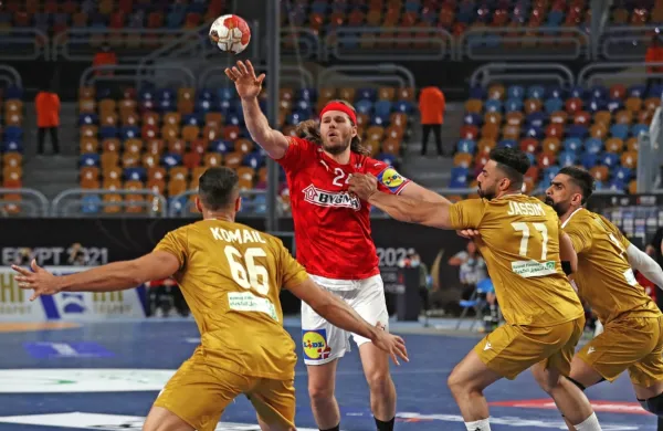 Mikkel Hansen (v rdečem dresu)  je z Danci  gladko opravil s 
tekmeci v prvem skupinskem delu.