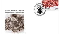 Nova  obeležja - znamka s čipko, pisemski ovitek in žig - Pošte 
Slovenije.
