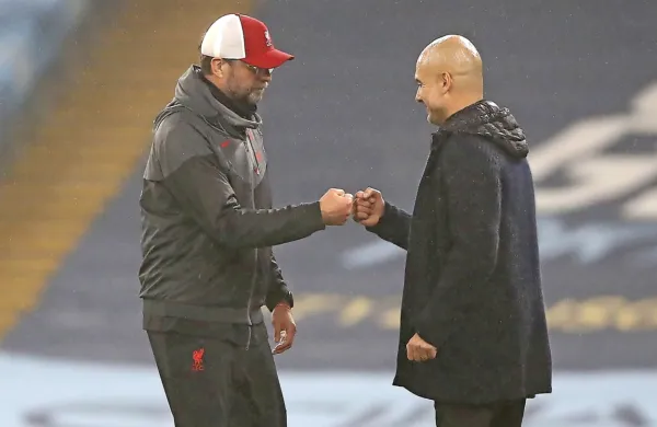 Jürgen Klopp (levo) in Pep Guardiola se bosta spet srečala v 
nedeljo. 