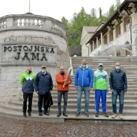 Olimpijska bakla v Postojnski jami