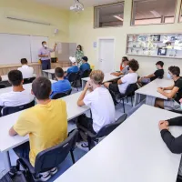 Prvi dan v &scaron;oli tudi pogovor o virusu in testiranju